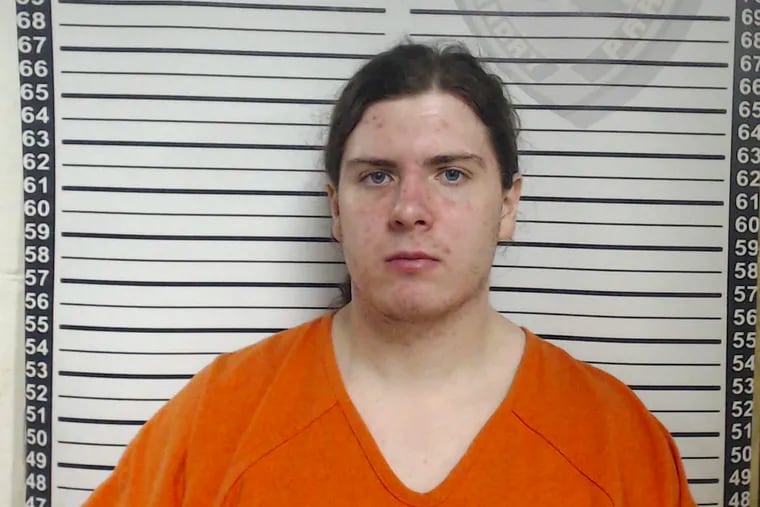 FILE - This file booking image released by the Louisiana Office of State Fire Marshal shows Holden Matthews, 21, who was arrested Wednesday, April 10, 2019, in connection with suspicious fires at three historic black churches in southern Louisiana. The U.S. Justice Department says it’s filing federal hate crime charges against Matthews in connection with three fires that destroyed African American churches earlier this year. (Louisiana Office of State Fire Marshal via AP)