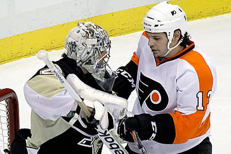 The Flyers are opposed to one realignment plan that has them and the Penguins in different divisions. (Keith Srakocic/AP file photo)
