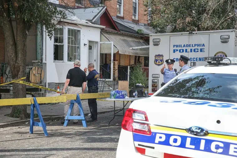 On Friday, Aug. 16, 2019, Philadelphia Police Crime Scene Unit investigators are shown on the 3700 block of North 15th in Tioga, where six Philadelphia police officers were shot and wounded Wednesday.