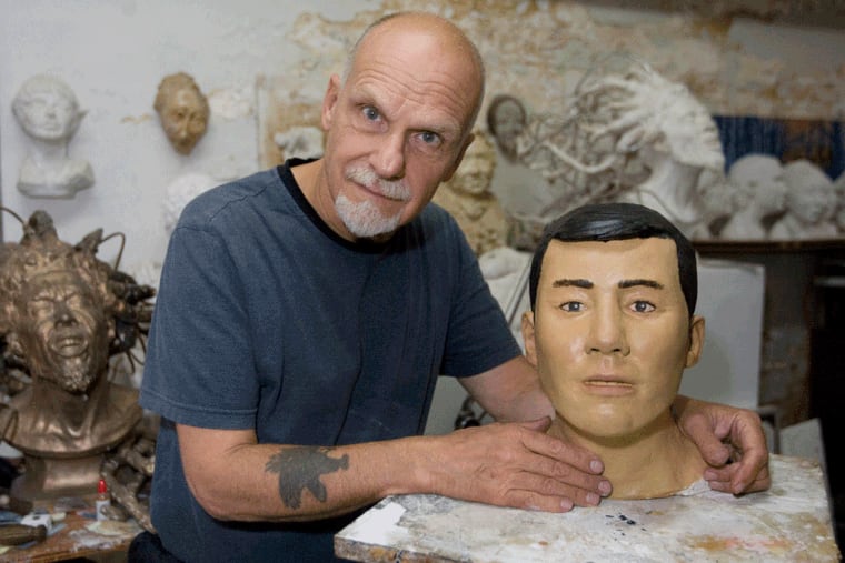 Sculptor Frank Bender shown here in his Philadelphia studio in 2008 with a bust he made for the Medical Examiner's Office. (JESSICA GRIFFIN / Daily News)
