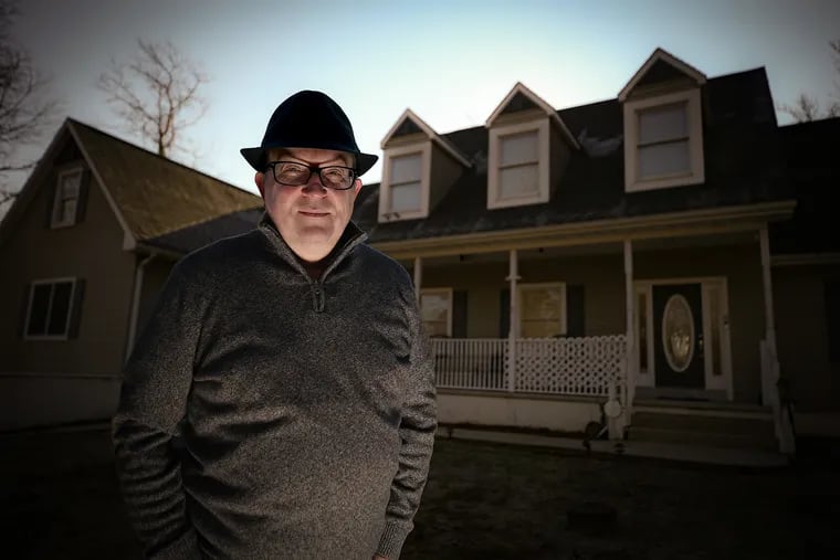 Nigel Bach poses for a portrait outside his home in Egg Harbor Township, N.J. on January 12, 2021. He has created a series of short horror movies for Amazon. His home is normally the background for his movies.