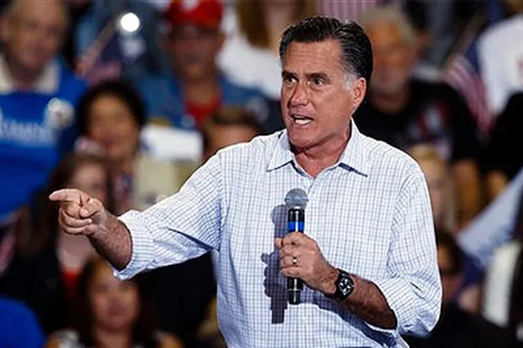 Republican presidential candidate former Massachusetts Gov. Mitt Romney speaks to supporters at The Seagate Center in Toledo, Ohio, Wednesday, Sept. 26, 2012, during a campaign stop. (AP Photo / Rick Osentoski)