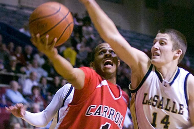 Archbishop Carroll's DJ Irving will miss action due to a broken bone in his hand. (Steven M. Falk / Staff Photographer)