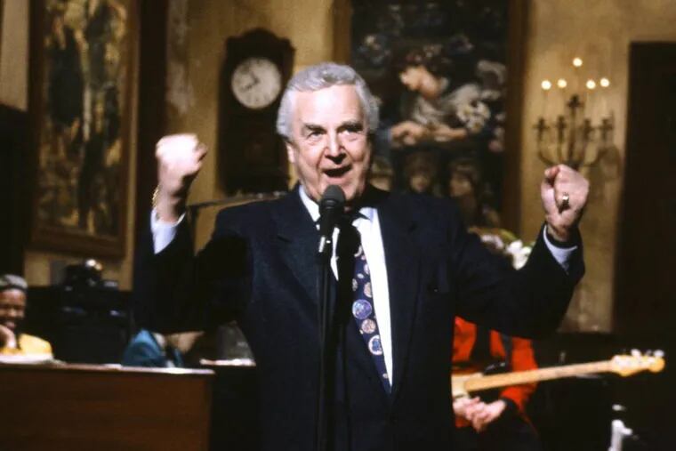 This March 14, 1992 photo provided by NBC shows announcer Don Pardo on the set of "Saturday Night Live."  Pardo, the durable television and radio announcer whose resonant voice-over style was widely imitated and became the standard in the field, died Monday, Aug. 18, 2014 in Arizona at the age of 96. (AP Photo/NBC, Al Levine)