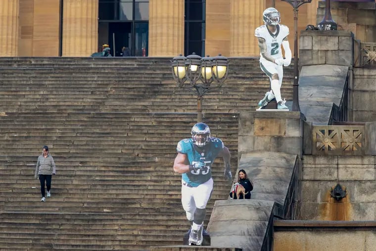 In foreground is #55 Brandon Graham and in background #2 Darius Slay. Giant cutouts of Philadelphia Eagles football players on steps of Philadelphia Museum of Art as seen on Wednesday, January 18, 2023.