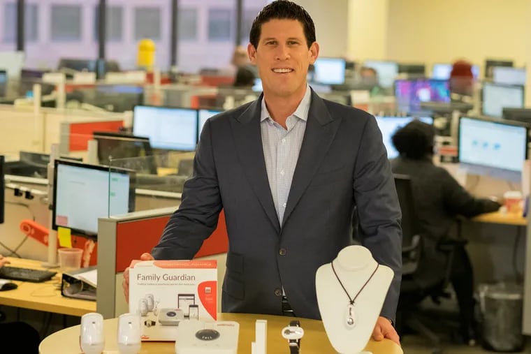 Geoff Gross, founder and CEO of Philly based Medical Guardian in the company's business call center with his new product "Family Guardian."