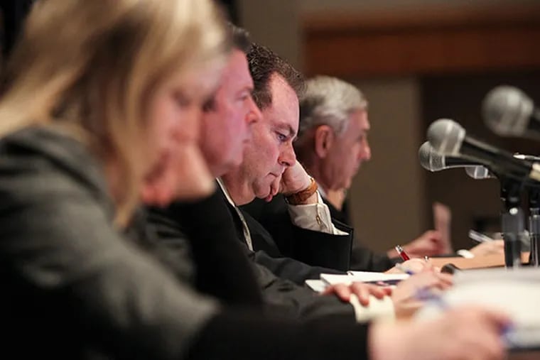The Pennsylvania Gaming Control Board listens and takes notes during the casino hearing for The Provence in the Pennsylvania Convention Center Tuesday, Jan. 28, 2014. (Stephanie Aaronson/Philly.com)
