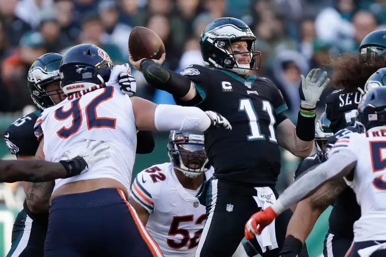 Eagles quarterback Carson Wentz throws a pass during the third quarter of Sunday's win over the Chicago Bears at Lincoln Financial Field.
