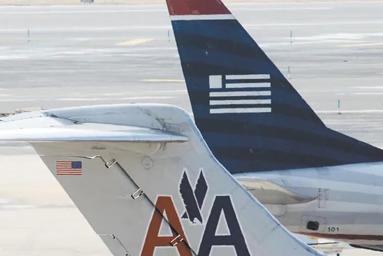 FILE - Six states, including Pennsylvania, and the Justice Department sue to block the merger of U.S. Airways and American Airlines. (AP Photo/Matt Rourke, File)