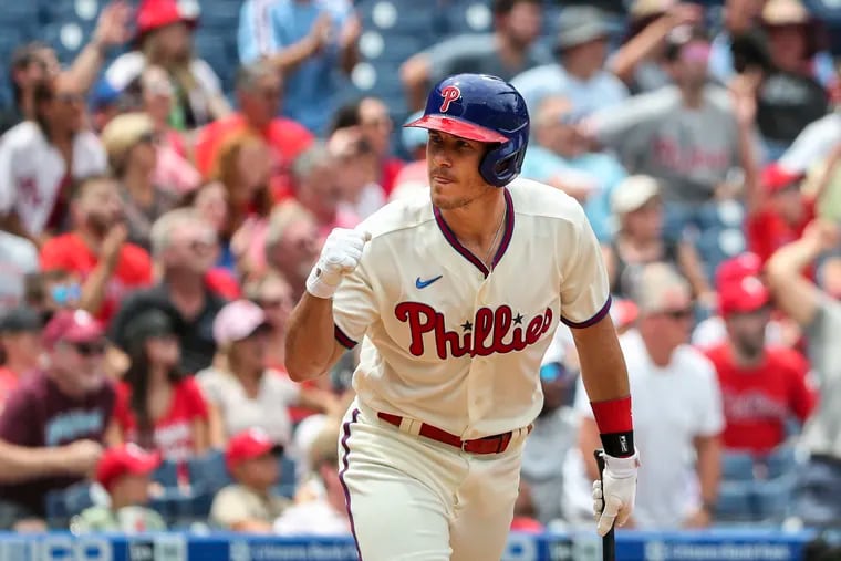 Phillies catcher J.T. Realmuto pumps his fist after hitting a two-run, walk-off homer against Miami Sunday afternoon at Citizens Bank Park. The 4-2 Phillies win was the completion of Saturday night's suspended game.