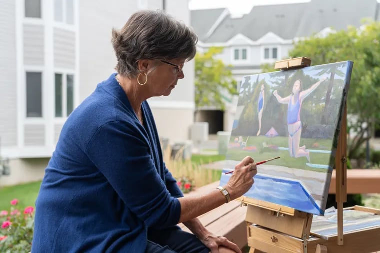 Liz Matt, who is retired from 6ABC, paints outside on her deck at her beach condo in Cape May. Matt and her husband, Steve Mushinski, split their time between their Jersey Shore condo and a home on Florida's west coast.