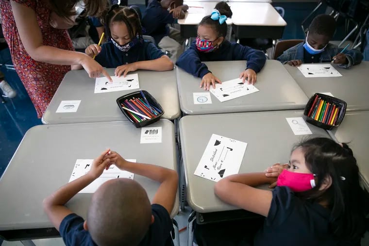 Students wear masks in the classroom at William H. Ziegler Elementary School in Philadelphia on Tuesday, Aug. 31, 2021.