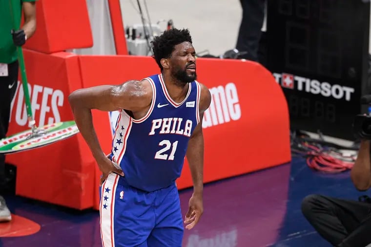 Joel Embiid suffered a torn right meniscus when he fell on his backside in Game 4. (AP Photo/Nick Wass)