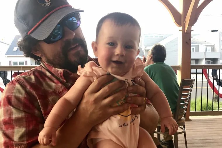 Chef Randy Rucker of River Twice and daughter Ruby on vacation in July 2021, her first beach trip.