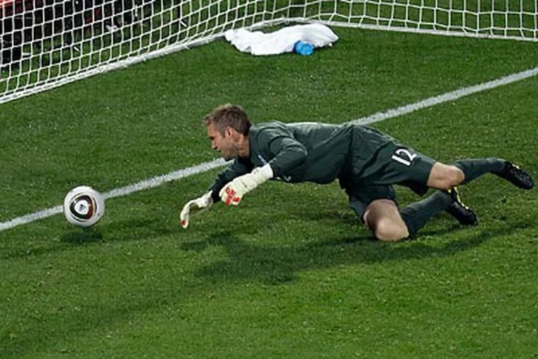 England goalkeeper Robert Green was skewered by the press back home for his blunder. (Michael Sohn/AP)