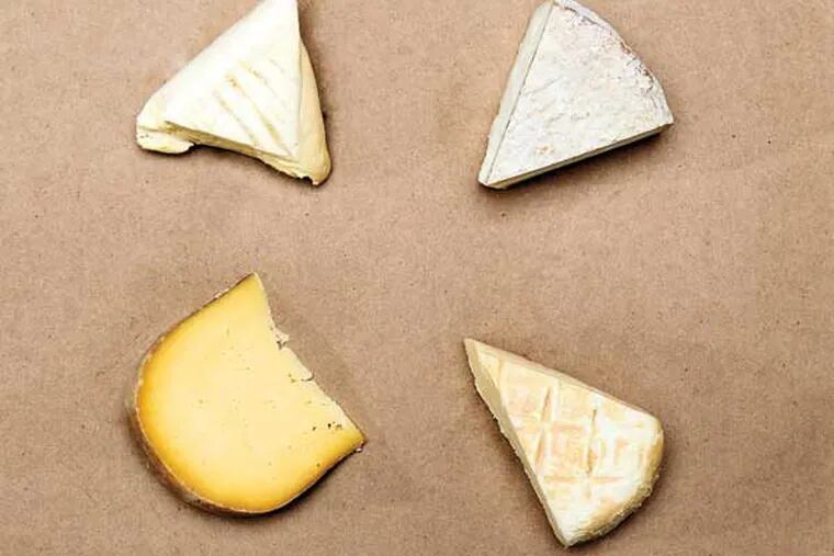 A platter shot of 4-5 different local cheeses washed in beer.   (Akira Suwa/Staff Photographer)