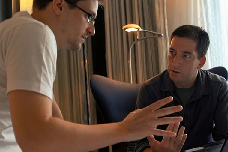 Snowden in a hotel room after alarming the world