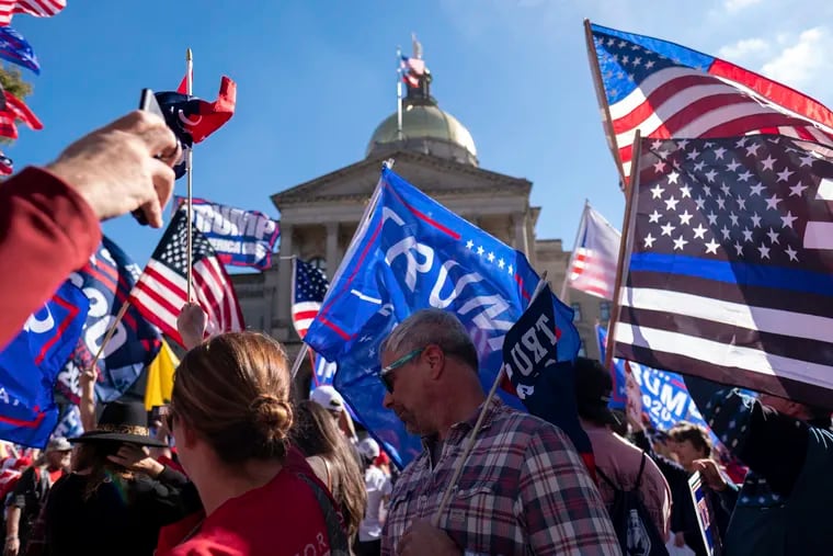 Supporters of President Donald Trump rally outside of the Georgia State Capitol in Atlanta on Saturday.