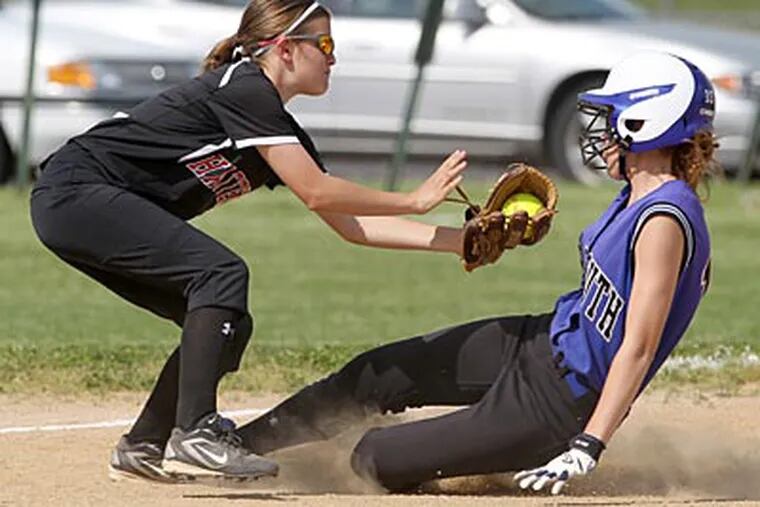 Hatboro-Horsham's Carlie Baldus tags out Central Bucks South's Melissa Edwards in the second. (Charles Fox/Staff Photographer)