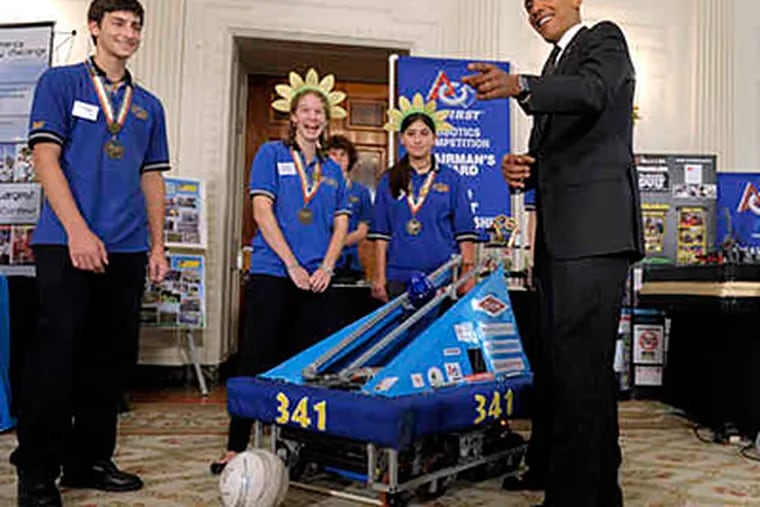 At the White House Science Fair yesterday, President Obama checks out the soccer-playing robot built by a student team from Wissahickon High School in Ambler. They won the Chairman's Award at the 2010 FIRST Robotics Championship in Atlanta.