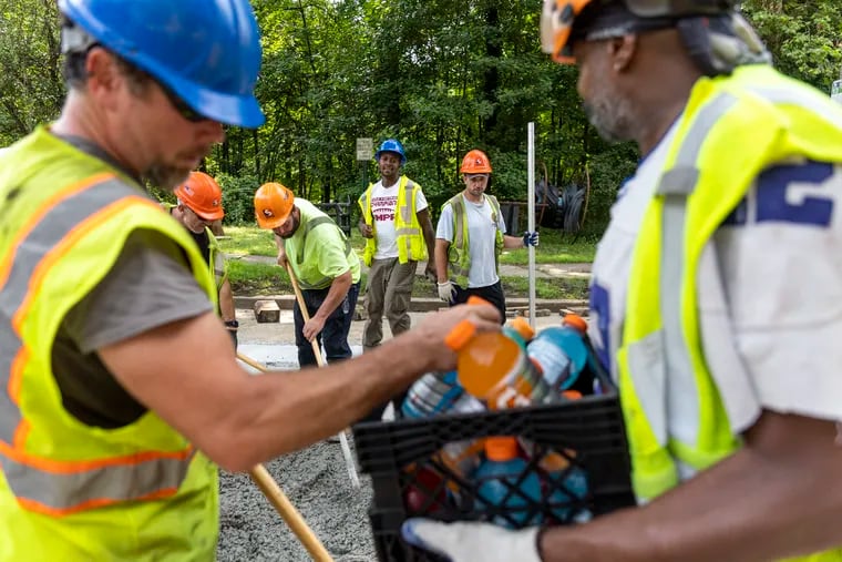 Brian Pollitt, president of TWU Local 234, bought Gatorade for workers out in the heat working on the new trolley railroads in Southwest Philadelphia on July 25, 2023.