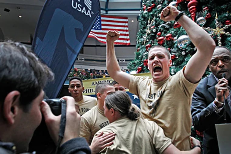 The military academies offer much, but demand more of cadets and midshipmen, who must serve at least five years after graduation. Above, West Pointers during a pep rally at Liberty Place. ALEJANDRO A. ALVAREZ / Staff Photographer