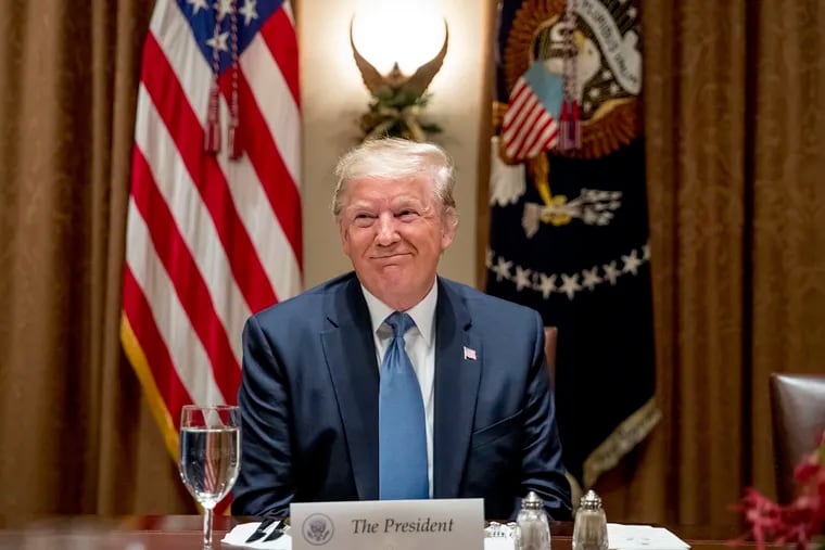 President Donald Trump smiles during a luncheon with members of the United Nations Security Council in the Cabinet Room at the White House on Thursday.