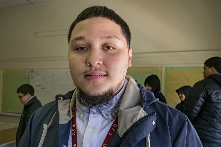 Ryan Rivera overcame a troubled youth and now dreams of being a police officer. He&#039;s shown here at El Centro de Estudiantes, his former school, where he returns often to mentor other students.  ED HILLE / Staff Photographer