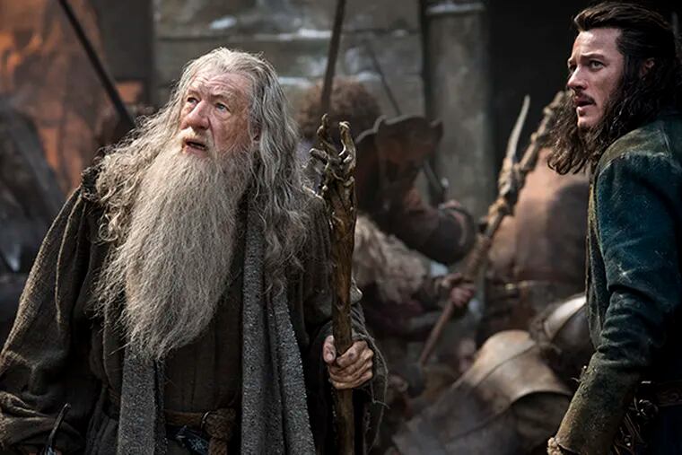 Ian McKellen and Luke Evans as Bard in the fantasy adventure "The Hobbit: The Battle of the Five Armies."