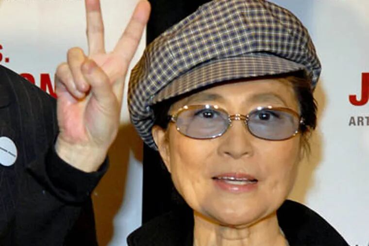 Yoko Ono flashes a peace sign during a press conference in New York in this Sept. 6, 2006 file photo.  At 76, Ono is still going strong with a new album. (AP Photo / Paul Hawthorne, FILE)