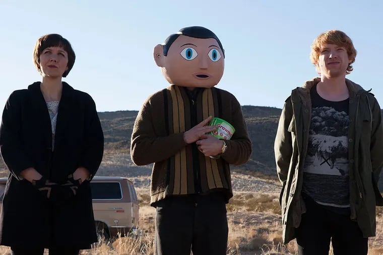 Michael Fassbender is Frank, in the mask head, with Maggie Gyllenhaal on theremin and Domhnall Gleeson as the hapless hero.