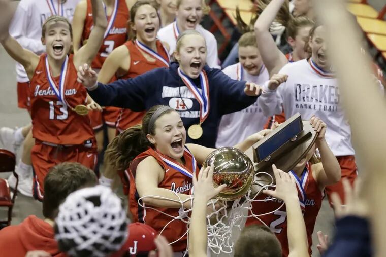 The Jenkintown players bring the PIAA Class A championship trophy over to their fans after a 51-46 defeat of Juniata Valley at the Giant Center.