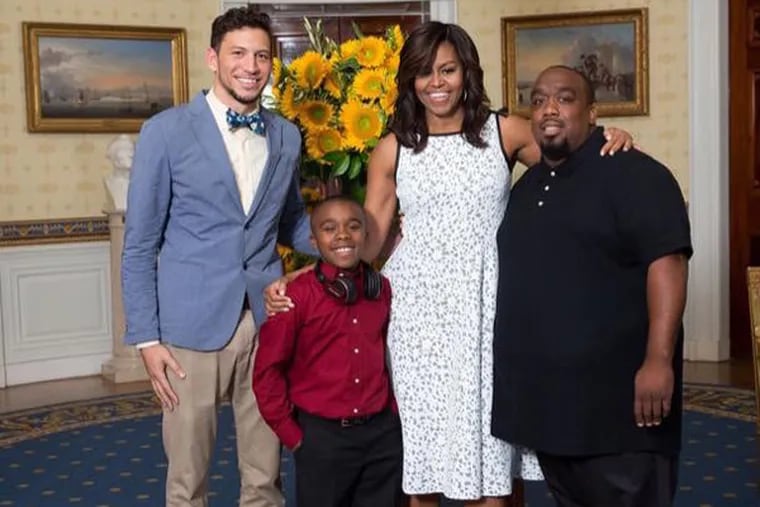 First Lady Michelle Obama with (from left to right) Jordan Royale Poole of the Scratch Academy; Dylan Curtis, 11; and Amos Curtis on July 14, 2016 in the Blue Room at the White House prior to the Kids' State Dinner.