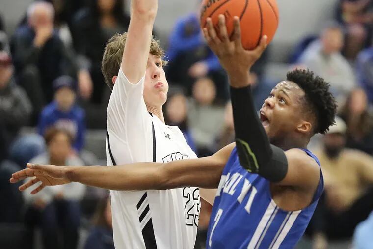 Bishop Eustace's Christian Tomasco, pictured blocking Paul VI's Tyshon Judge in a game last January, scored 24 points in the Crusaders' win over Hilliard (Fla.) on Friday.