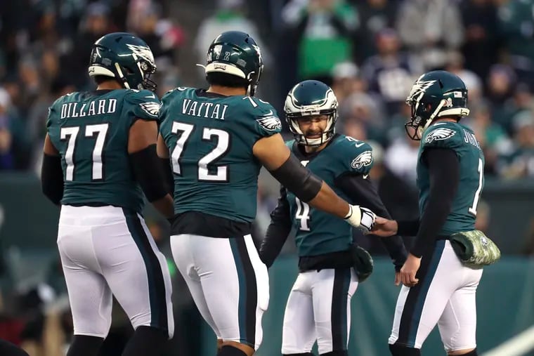 Eagles kicker Jake Elliott (second from right) celebrates after making a field goal against New England on Nov. 17, 2019.