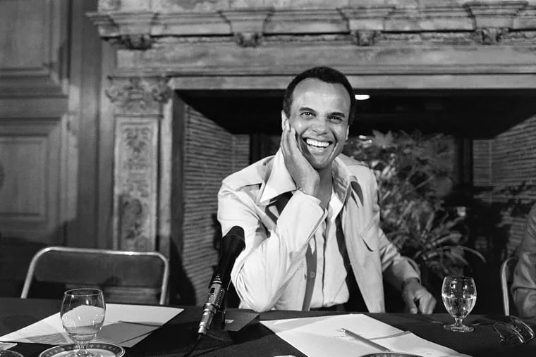 Harry Belafonte gives a press conference in 1976 at the George V Hotel in Paris.