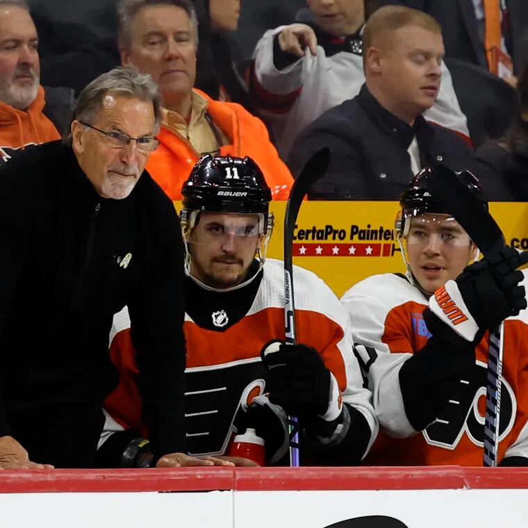 Flyers head coach John Tortorella yells at the game officials on Thursday night. Tortorella took exception with the major penalty called on Garnet Hathaway.
