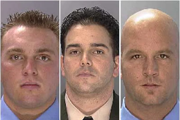 Philadelphia Police Officer George Sambuca, left; Detective Keith Gidelson, center; and Officer Joseph Mcintyre Jr., were charged as part of a steroid distribution ring.