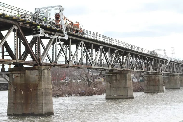 Inspectors checking SEPTA's Bridgeport Viaduct in 2013, when it was closed four months for repairs. It is scheduled to be rebuilt.