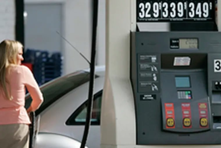 A motorist fills up at a Citgo station in South Philadelphia. The average price of gasoline in the five-county Philadelphia area yesterday was $3.10 a gallon, up 24 cents from a month ago, according to AAA Mid-Atlantic.