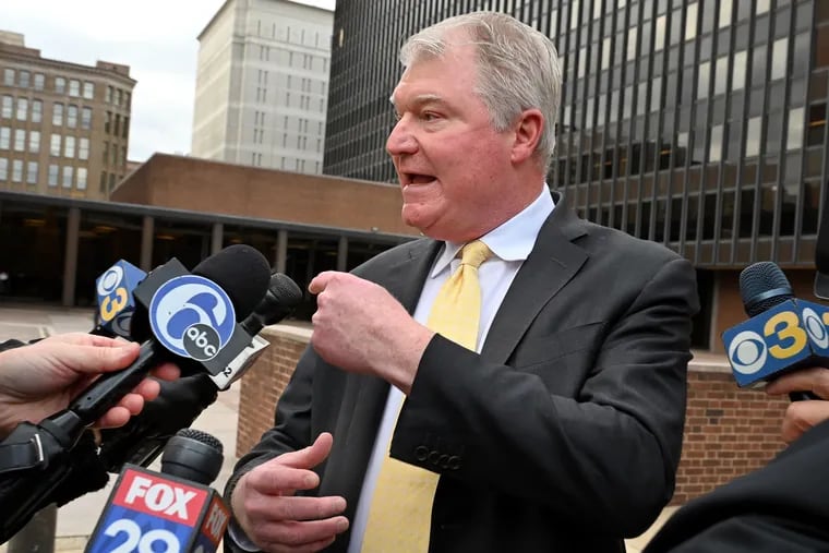 IBEW Local 98 leader John “Johnny Doc”  Dougherty addresses the media as he leaves the James A. Byrne U.S. Courthouse in Center City after being convicted of conspiracy and bribery. The judge scheduled his sentencing for February.