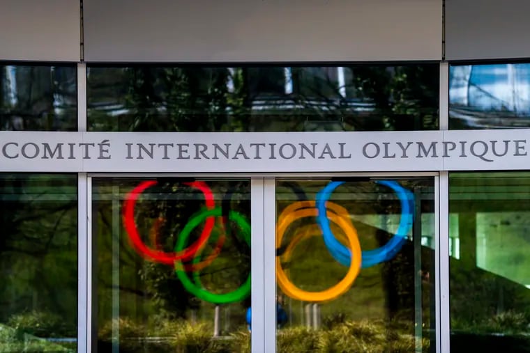 The Olympic Rings are displayed at the entrance of the International Olympic Committee headquarters during the coronavirus pandemic in Lausanne, Switzerland on March 24, 2020.