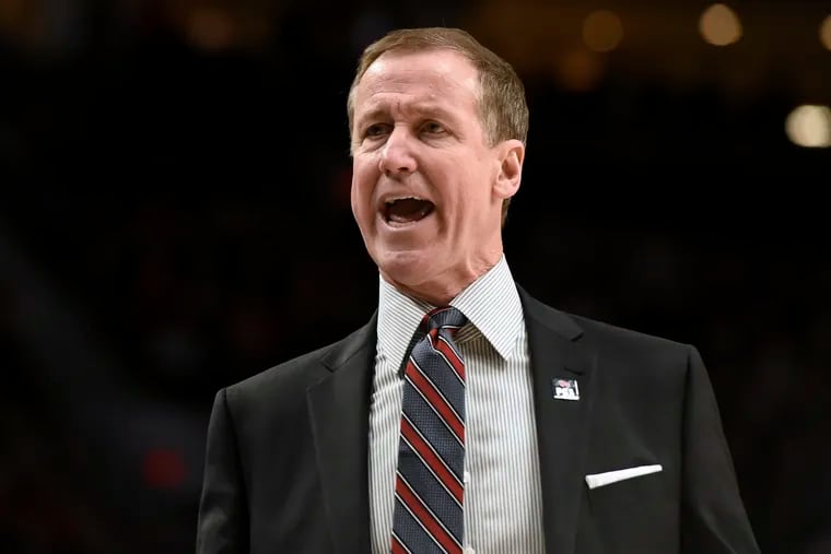 Portland Trail Blazers coach Terry Stotts yells to the officials during the first half of the team's NBA basketball game against the Utah Jazz in Portland, Ore., Wednesday, Jan. 30, 2019. (AP Photo/Steve Dykes)