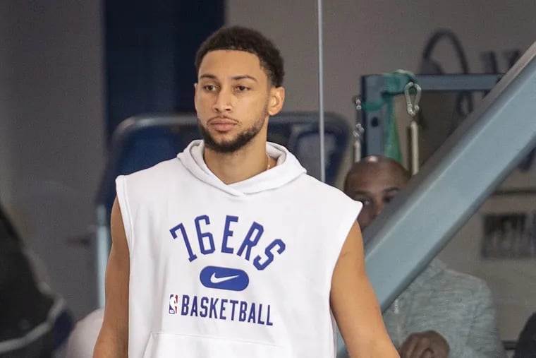 Sixers star Ben Simmons looks on during practice on Monday. His availability for Friday's game is still up in the air.