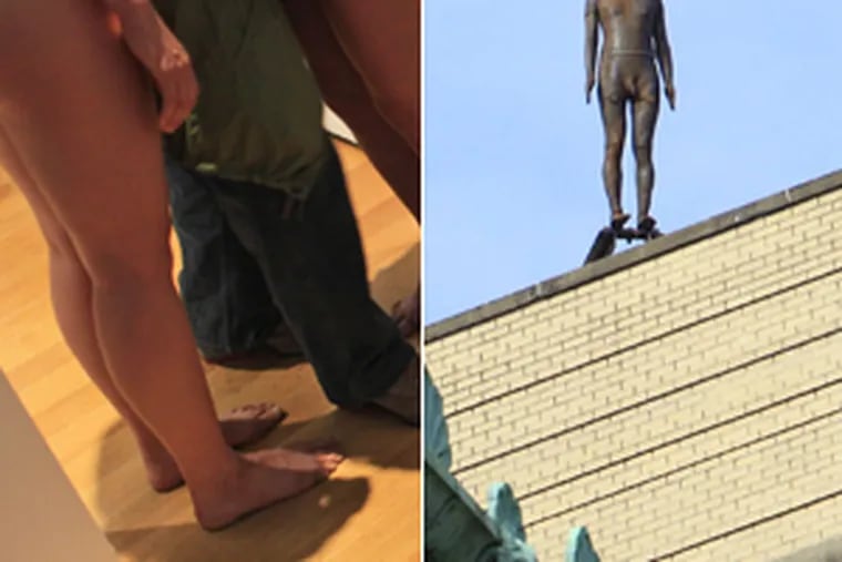 Two eyebrow-raising exhibits in New York: At left, a patron squeezes between nude people in a doorway, part of a Marina Abramovic exhibit at the Museum of Modern Art. At right, a sculpture by Antony
Gormley, part of the installation "Event Horizon," is seen on the roof of 1133 Broadway. Such works have been mistaken for possible jumpers.