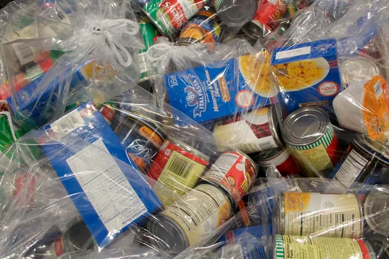 Bags of food packed by volunteers at the Backpack Buddies program at Second Harvest Food Bank in Nazareth, Pa. (AP Photo/Michael Rubinkam, File)