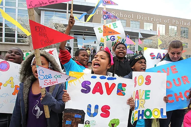 Students from the Creighton School , including Aaniyah Sullivan (center), rally before a hearing by the School Reform Commission at the School District Building. CHARLES FOX / File Photograph