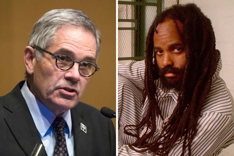 Philadelphia District Attorney Larry Krasner (left) and convicted cop-killer Mumia Abu-Jamal.