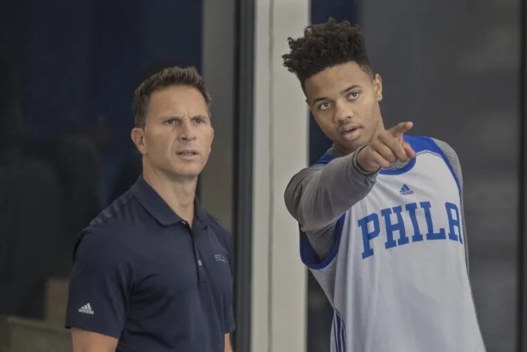 Sixers’ assistant coach Billy Lange with Markelle Fultz during training camp.