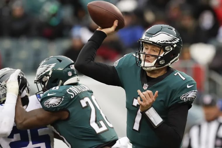 Eagles quarterback Nate Sudfeld throws a pass against the Dallas Cowboys during the third quarter on Sunday.